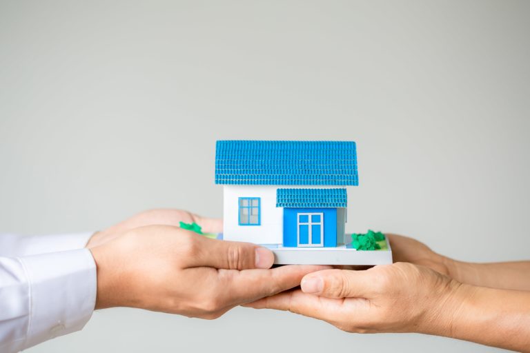 real estate broker agent presenting consult customer decision making sign insurance form agreement min scaled